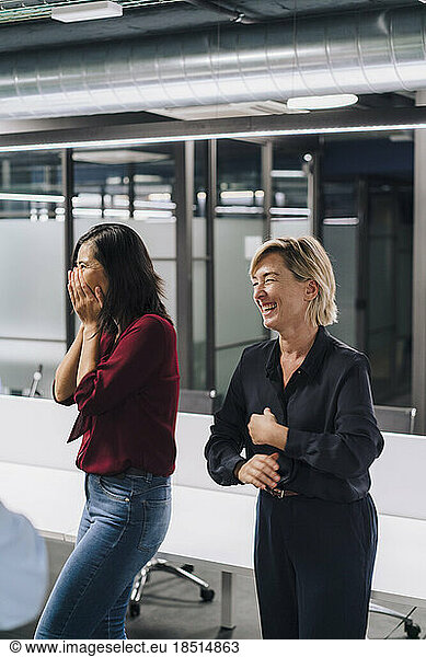 Happy businesswomen having fun in office