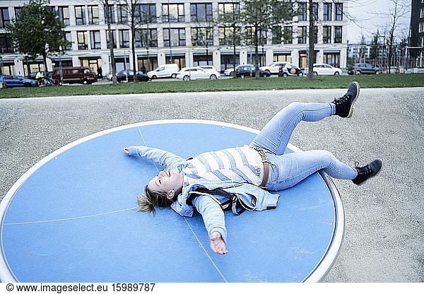Happy carefree woman in playground