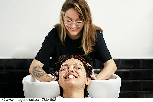 Happy client at the hairdresser.