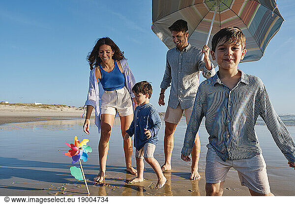 Happy family enjoying at beach