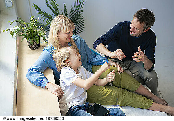 Happy family enjoying together at home