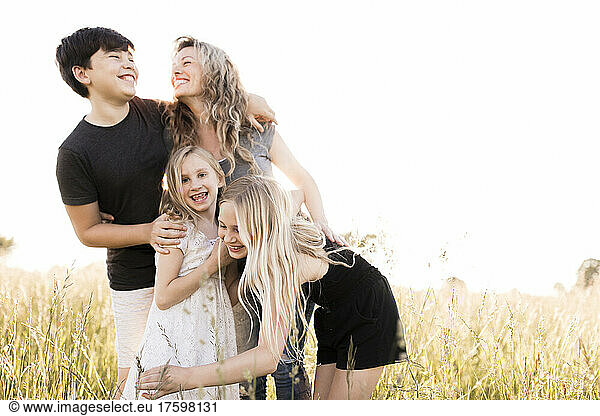 Happy family in agricultural field