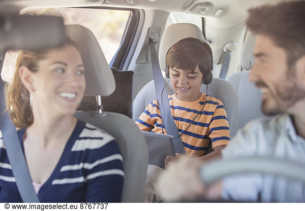 Happy family inside car
