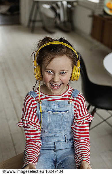 Happy girl wearing headphones