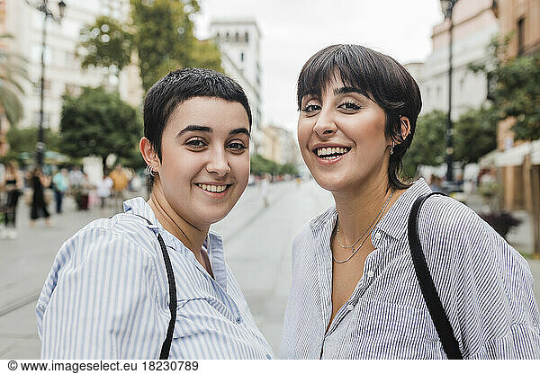 Happy lesbian couple with short hair