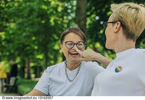 Happy lesbians having fun in park