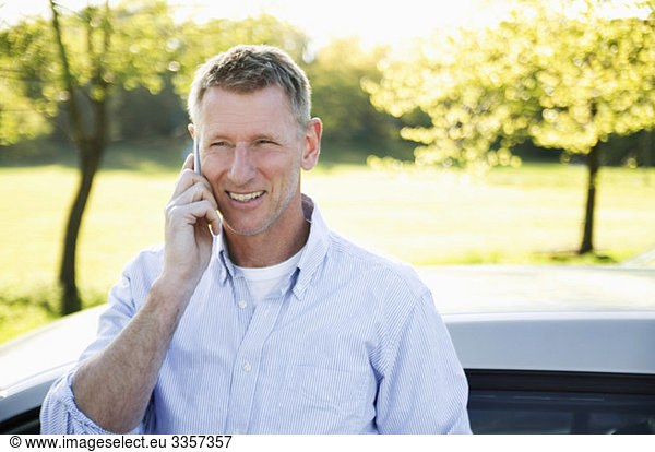 Happy man talking in phone