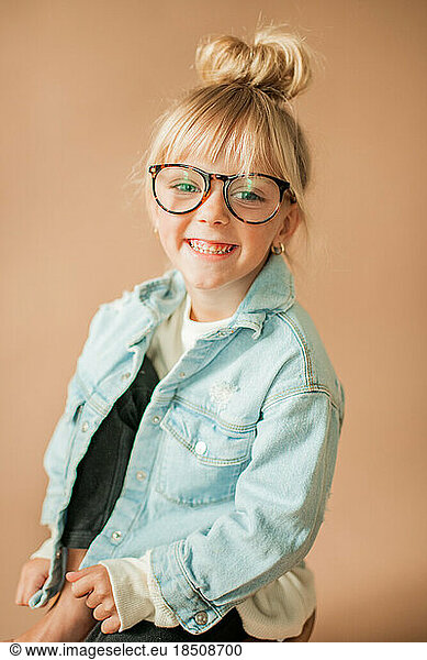 Happy Portrait of Cute Little Toddler Girl with Glasses Smiling