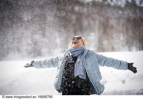 Happy women enjoying the snow