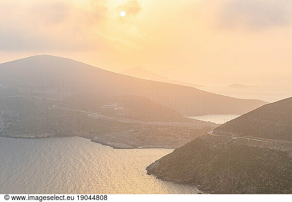 Hazy morning view of Fourni coastline and Agios Minas island.