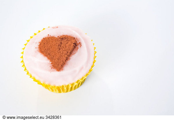 Heart shape on cupcake