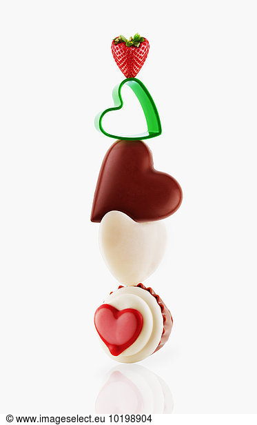 Heart-shaped desserts balancing