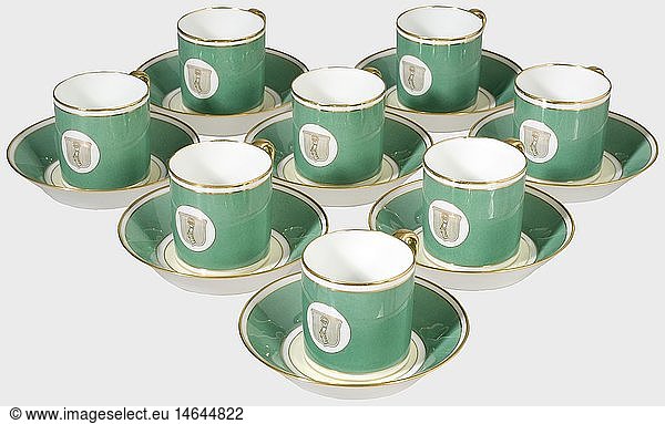 Hermann GÃ¶ring  eight mocha cups and saucers from his picnic hamper Presentation service by the SÃ¨vres Factory on occasion of his 50th birthday on 12 January 1943. White porcelain with green glazed painting. The small GÃ¶ring family coat of arms is painted in gold on the front of the cups and in the centre of the saucers. Gold rims. The bottom displays the factory mark 'SÃ¨vres Manufacture Nationale France' in underglaze green  and the letters 'b' 'c'  'f'  or 'g' and a golden Iron Cross '1939'   with other impressed marks  such as 'ag/2532' or 'ag/ - 32 x'. Cup height 6.5 cm. Diameter 6.3 cm. Saucer diameter 13 cm. One cup has a tiny chip. Provenance: Keith Wilson Collection  Kansas City. The complete set of mocha cups from the picnic hamper. Never before offered at auction.  historic  historical  1930s  20th century  NS  National Socialism  Nazism  Third Reich  German Reich  Germany  German  National Socialist  Nazi  Nazi period  fascism  dish  dishes  cup  cups  object  objects  stills  clipping  clippings  cut out  cut-out  cut-outs