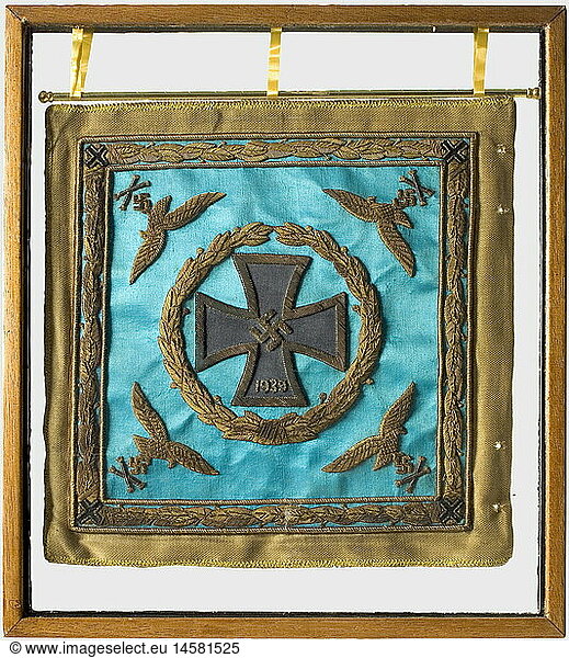 Hermann Göring.  High quality museum preparation of his automobile flag as Reich Marshal and Minister of Air Transport 1941. Light blue silk fabric with raised imperial eagle in gold embroidery above crossed Reich Marshal batons  with a 1939 Iron Cross in a laurel wreath embroidered en suite on the other side  and with Luftwaffe eagles as well as Marshal's batons in the corners  Each side is surrounded with laurel bordering and gold brocaded edges. 30 x 30 cm. On a brass staff and in a wooden frame glazed on both sides. (one small crack). historic  historical  1930s  20th century  Air Force  branch of service  branches of service  armed service  armed services  military  militaria  air forces  object  objects  stills  clipping  clippings  cut out  cut-out  cut-outs  flag  flags  insignia  symbol  symbols  emblem  emblems