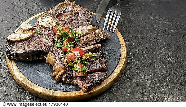 High angle steak with cutlery copy space