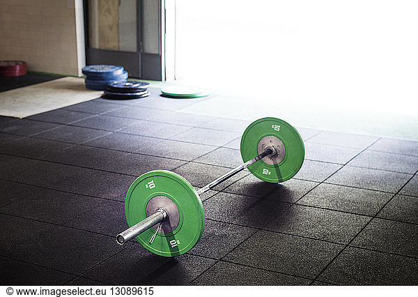 High angle view of barbell in gym