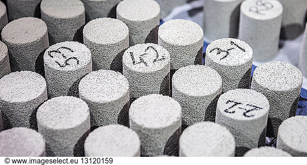 High angle view of foam corks arranged on table in factory