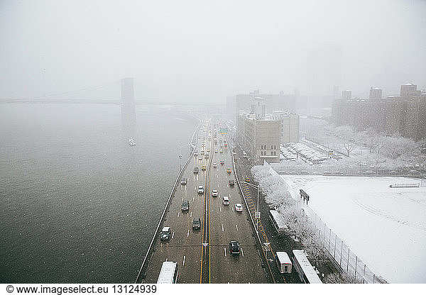 High angle view of highway by East River during winter