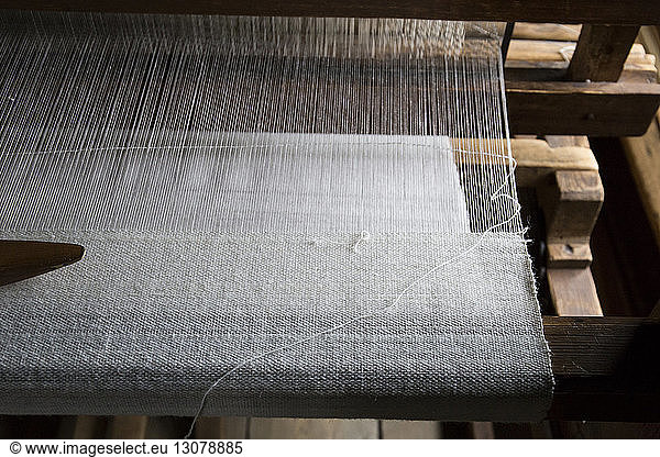 High angle view of loom in textile industry