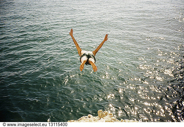 High angle view of man diving into sea