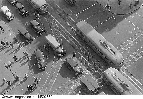 High Angle View of Street Scene with Pedestrians  Street Cars and Automobiles  14th Street and Pennsylvania Avenue  Washington DC  USA  David Myers  Farm Security Administration  1939