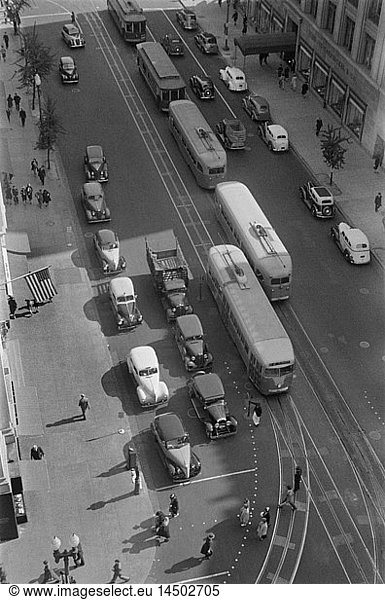 High Angle View of Street Scene with Pedestrians  Street Cars and Automobiles  14th Street and Pennsylvania Avenue  Washington DC  USA  David Myers  Farm Security Administration  1939