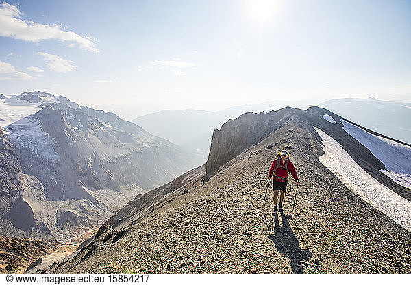 Hiker crosser talus slope in B.C. Canada.
