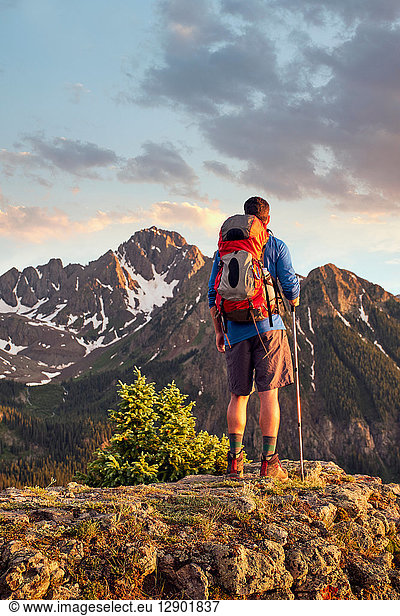 Hiker on mountain peak Mount Sneffels Ouray Colorado USA