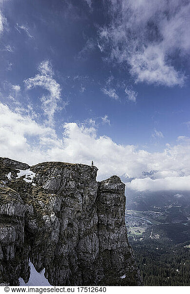 HIker standing on viewpoint  Saeuling  Bavaria  Germany
