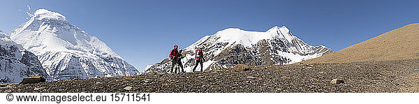 Hikers at Chonbarden Glacier  Dhaulagiri  French Pass  Dhaulagiri Circuit Trek  Himalaya  Nepal
