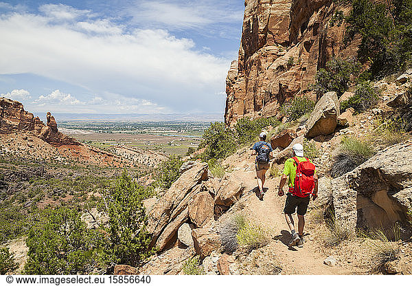 Hikers descend Wedding Canyon Trail in Colorado National Monument