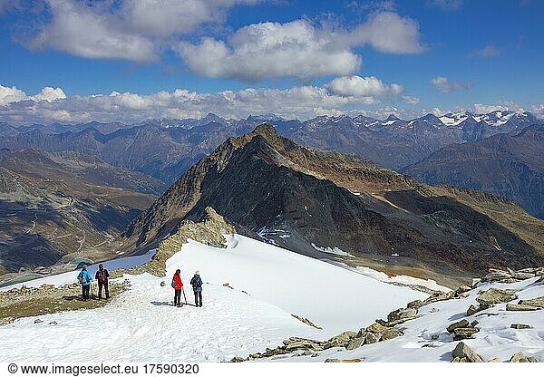 Hikers on the way to the nature platform on the Schwarze Schneid on the Rettenbach glacier  Sölden  Ötztal  Ötztal Alps  Tyrol  Austria  Europe