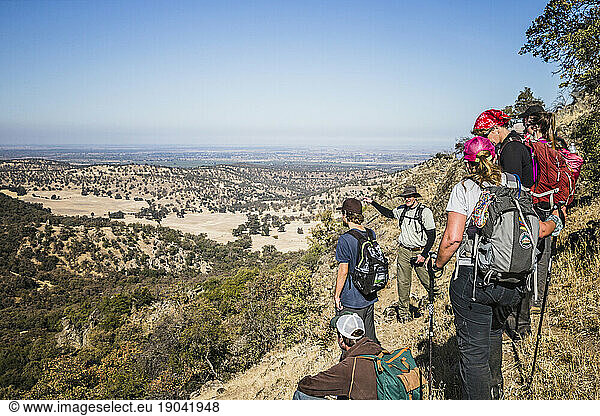 Hikers overlooking the Central Valley The Sutter Buttes  formerly known as the Marysville Buttes