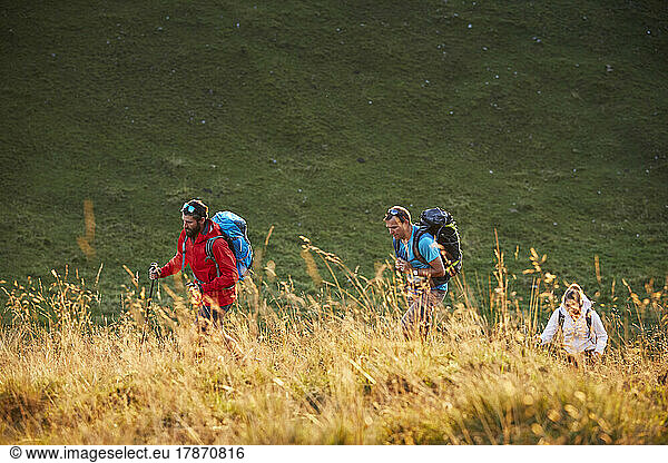 Hikers with backpacks on mountain  Mutters  Tyrol  Austria