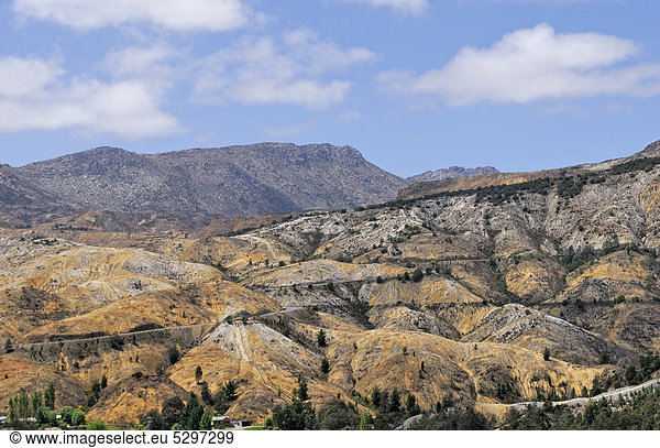 Hills eroded after deforestation and air pollution for copper mining near Queenstown  Lunar Landscape  Tasmania  Australia