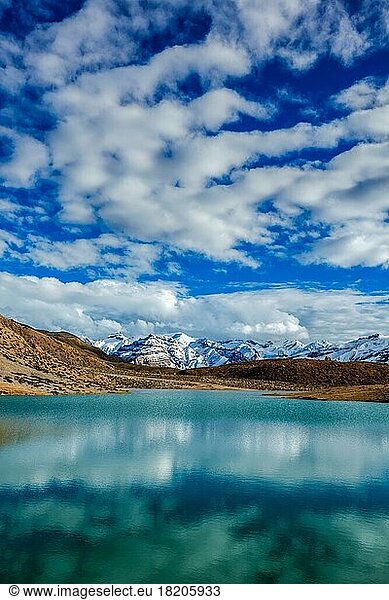 Himalayas mountains refelcting in mountain lake Dhankar Lake. Spiti Valley  Himachal Pradesh  India  Asia