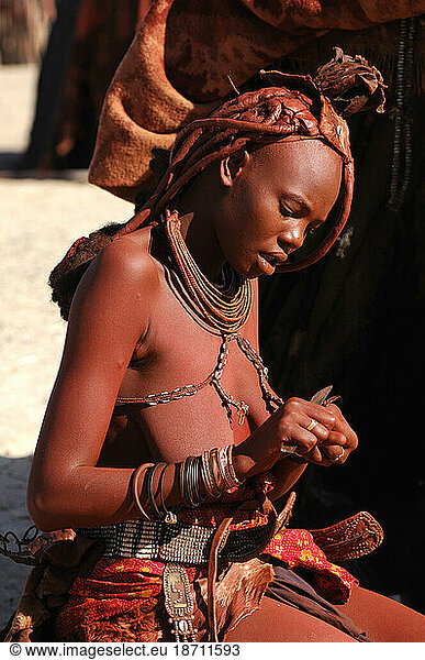 Himba woman  Himba village near Purros  Kaokoland  Kunene Region  Namibia