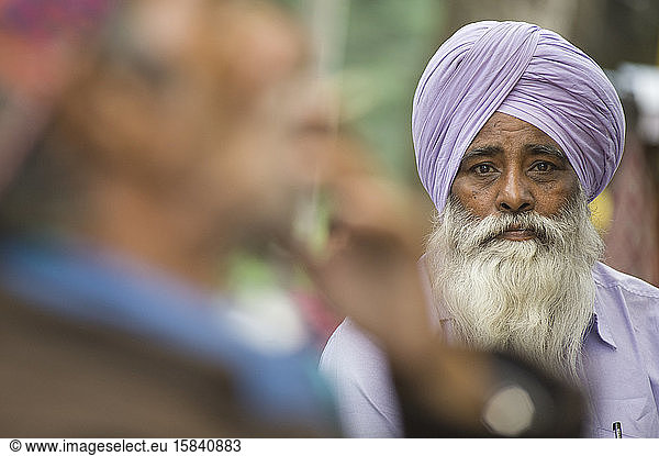 Hindu man with lilac turban and long white beard