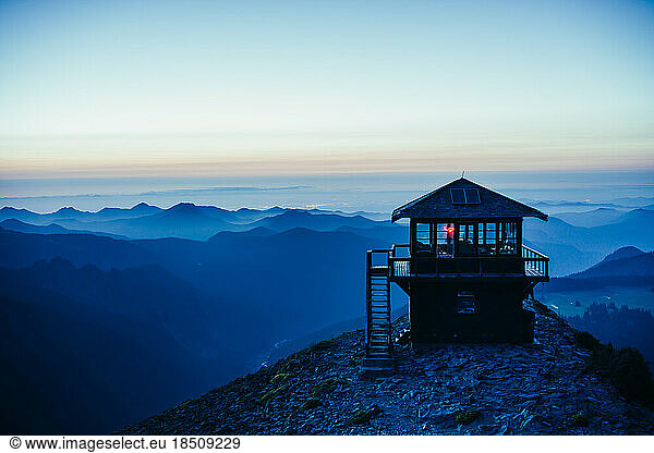 Historic fire lookout at Mt Rainier NP during summer mountain sunset