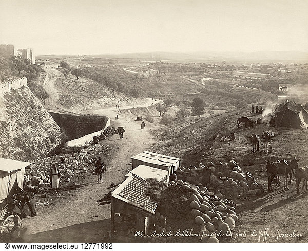 HOLY LAND: JERUSALEM,  c1875. Dirt road outside the city wall of Jerusalem at left. At right is a Bedouin camp. Photograph by Felix Bonfils,  c1875.
