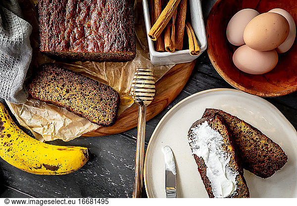 Home made banana bread rustic flat lay fresh ingredients honey eggs