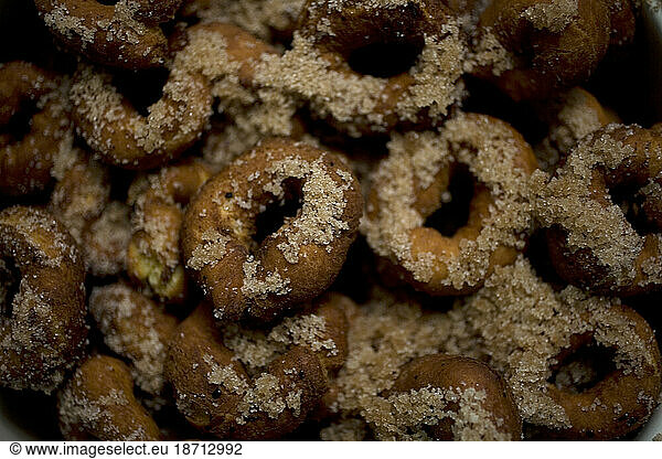 Home made culins coated with sugar sit in a home's kitchen in Prado del Rey village  Cadiz province  Andalusia  Spain.