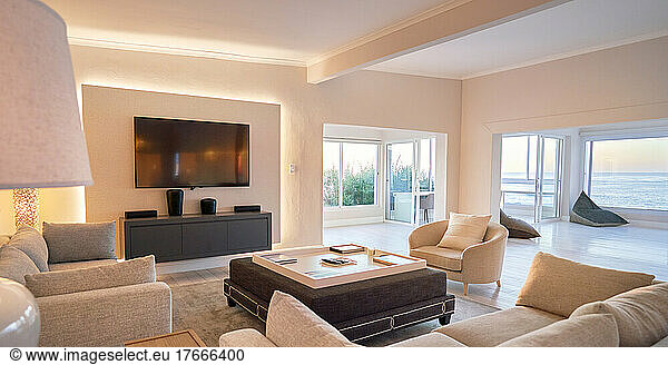 Home showcase interior living room with ocean view and TV