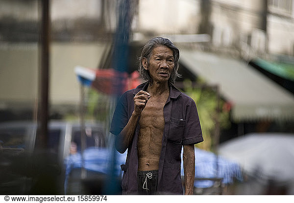 Homeless wandering in the streets of Klong Toey