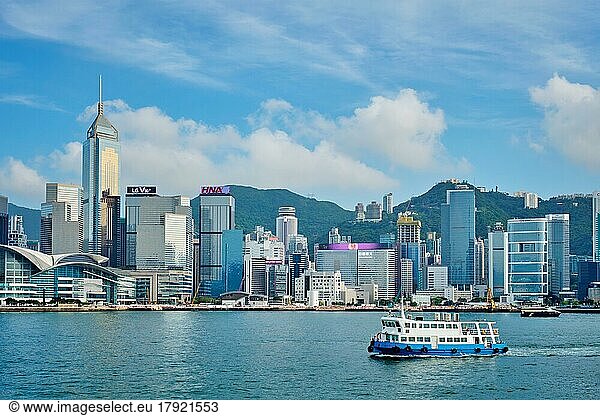 Hong Kong  China  May 1  2018: Hong Kong skyline cityscape downtown skyscrapers over Victoria Harbour on sunset. Hong Kong  China  Asia