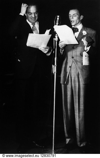 HOPE AND SINATRA  1947. American comedian Bob Hope with singer Frank Sinatra at the NBC Radio studio  December 1947.