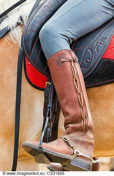 Horse rider with ornate leather riding boots  Tuscany Italy