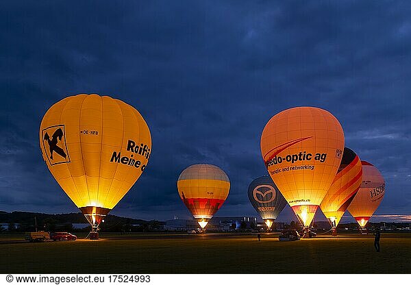 Hot air balloons on the ground during balloon lighting  airport  Fürstenfeld  Styria  Austria  Europe