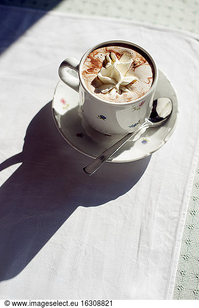 Hot chocolate in old-fashioned cup