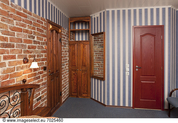 Hotel Bedroom Interior With Brick Walls
